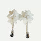Elegante weiße Blumen-Ohrhänger mit Kristalltropfen