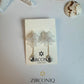 Elegant White Flower Dangle Earrings with Crystal Teardrop