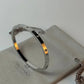 Zircon Studded Stainless Steel Silver Plated Bangle Bracelet - Silver
